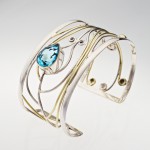 Silver Bracelet with heart shaped blue stone